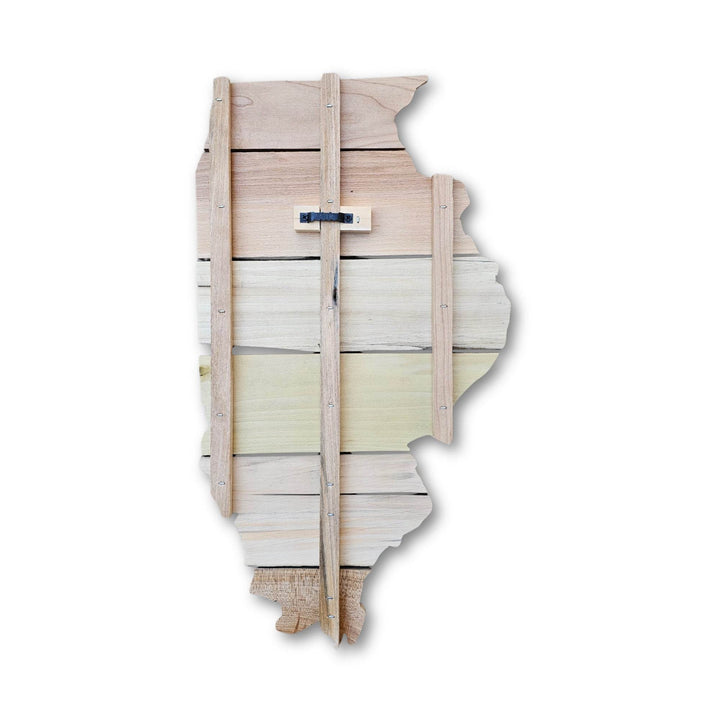 Back of wooden wall art in the shape of Illinois on a white background