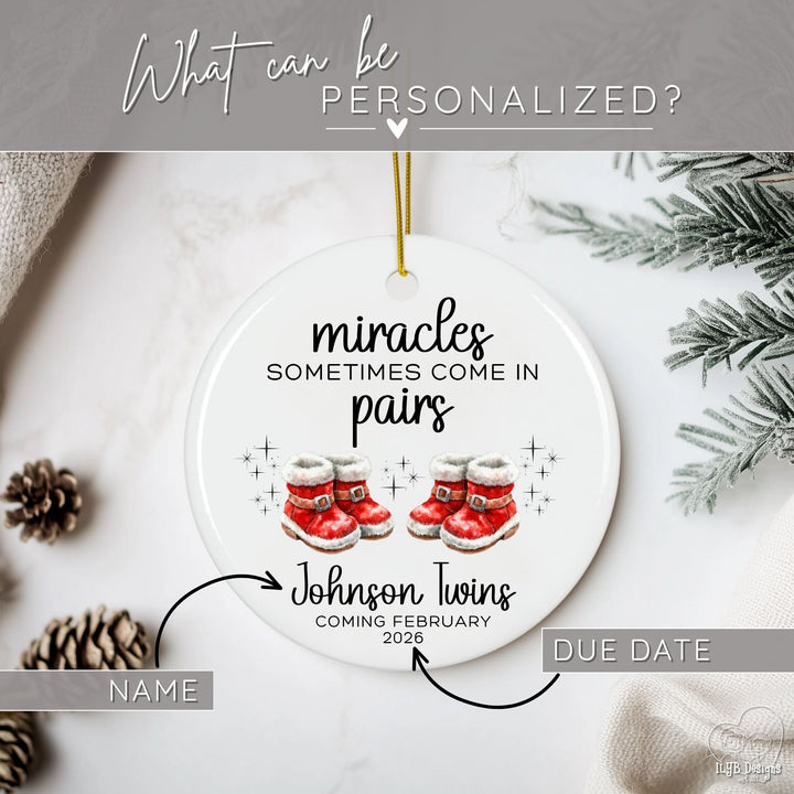 Graphic showing what part of miracles sometimes come in pairs twins pregnancy Christmas ornament can be personalized. Arrows are pointing to the family name or baby names and due date.