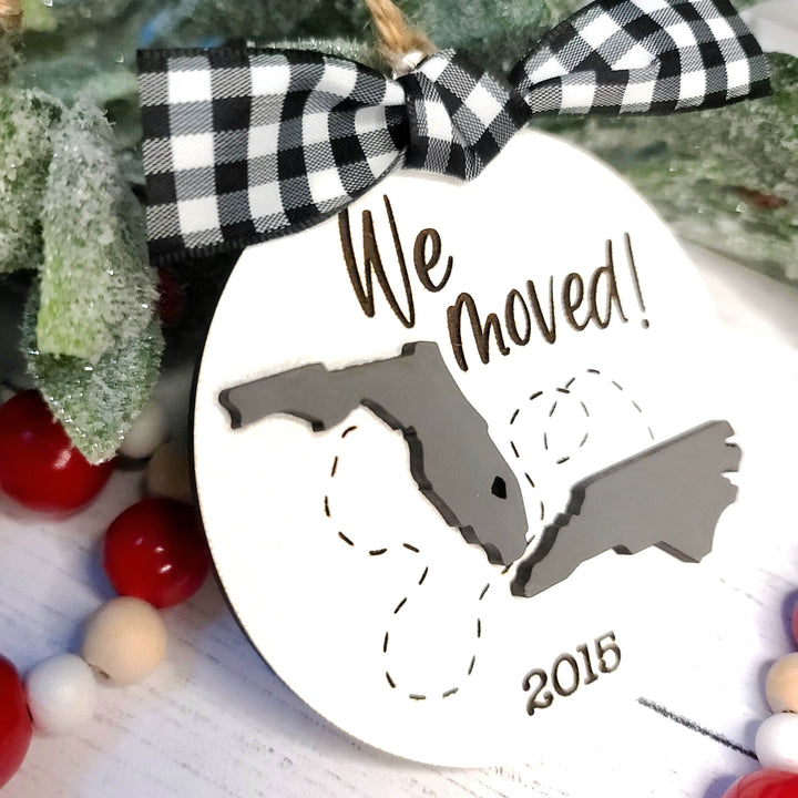 We Moved / New Adventures State Silhouette Christmas Ornament | Personalized Laser Cut Wood Ornament - ILYB Designs
