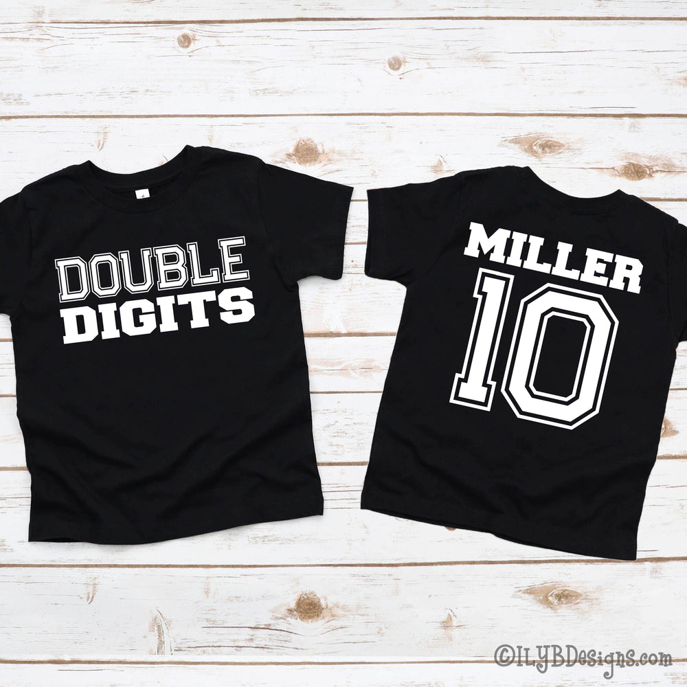 Front and back of black t-shirt with 'DOUBLE DIGITS' on front and ' MILLER 10' on back in white text in collegiate font.