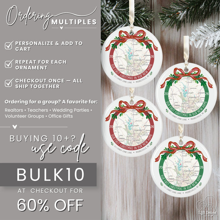 Four round Christmas ornaments with custom printed maps, red bows, and green holly accents hanging on a rustic wood surface with pine branches. The left side includes promotional text for bulk ordering and a discount code.