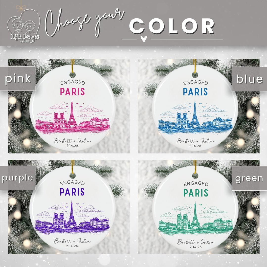 Four personalized Christmas ornament designs shown in a color chooser layout, labeled pink, blue, purple, and green, with Eiffel Tower illustrations and the names &
