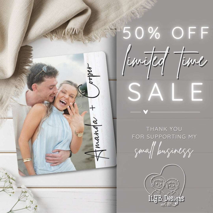 Promotional graphic with a couple photo and sale text on a wooden surface.