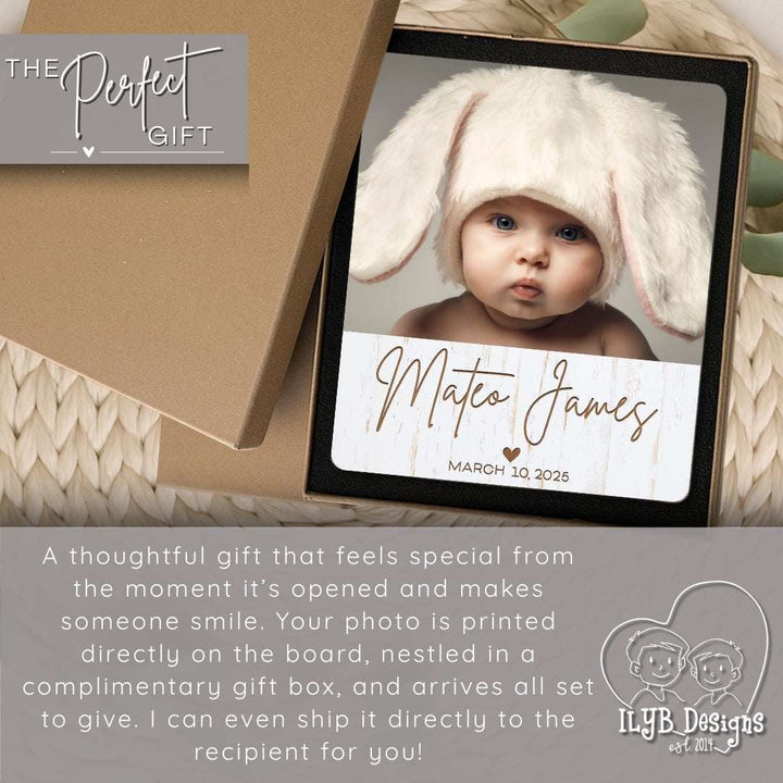 Personalized photo plaque with a baby's name and date, displayed in a gift box.