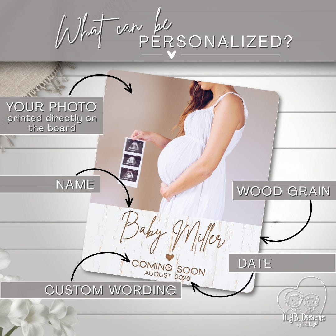 Personalized baby announcement board with a pregnant woman holding a photo of ultrasound images.