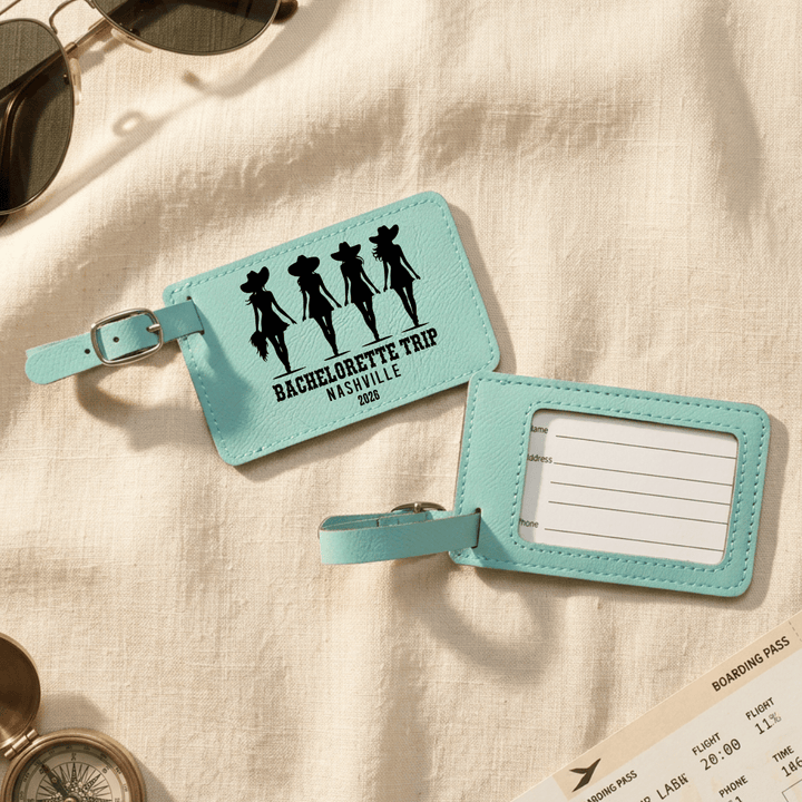 Front and back of turquoise luggage tags with a bachelorette design on a beige fabric background.