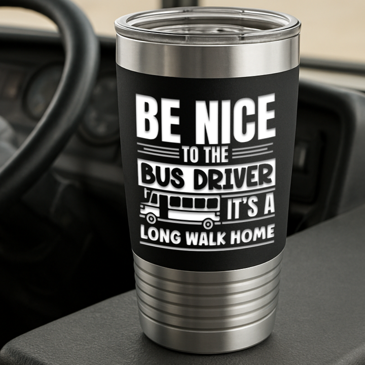 black tumbler with 'be nice to the bus driver it's a long walk home' engraved in white with a bus in the background