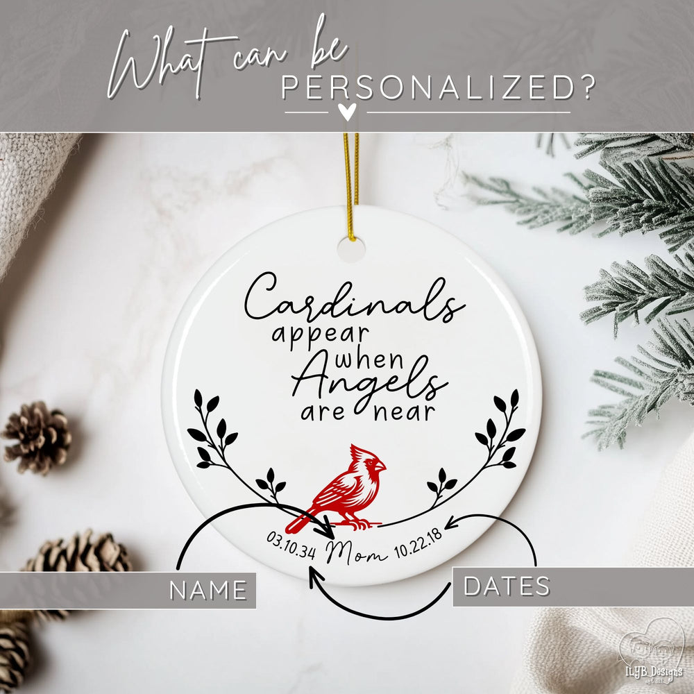 Graphic showing what can be personalized on the cardinal memorial ceramic ornament featuring the touching phrase “Cardinals appear when Angels are near.” The ornament is beautifully designed with a red cardinal, delicate branches, and your loved one’s personalized name and birth/death dates.