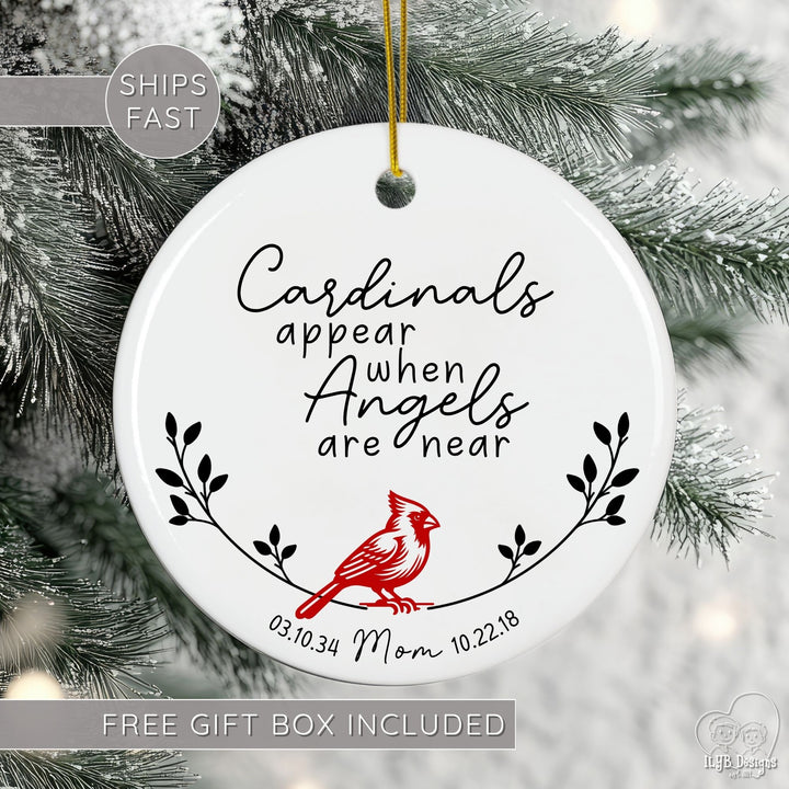Personalized cardinal memorial ornament featuring the touching phrase “Cardinals appear when Angels are near.” Beautifully designed with a red cardinal, delicate branches, and your loved one’s name and birth/death dates, this ceramic ornament is a meaningful Christmas remembrance keepsake. Free gift box included. Ships fast.