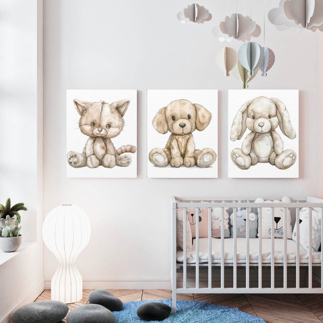 Nursery room with three canvas prints of a stuffed animal cat, dog, and bunny above a crib.