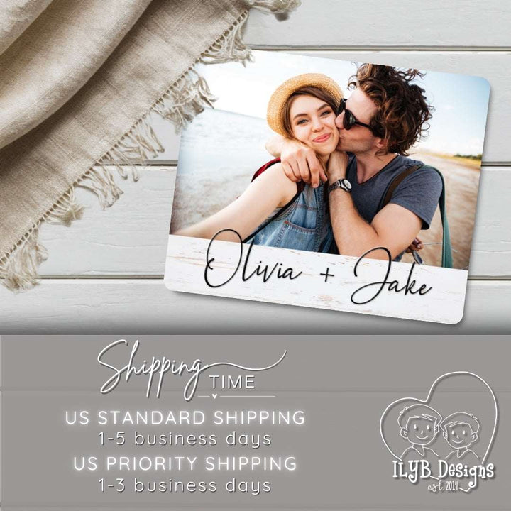 Wood photo plaque with a photo of a couple and text overlay on a wooden surface