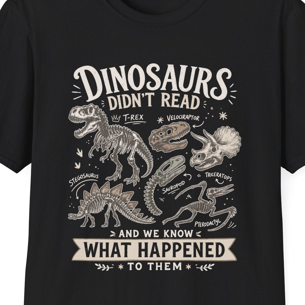 Black t-shirt with white text 'dinosaurs didn't read and we know what happened to them' on a white background