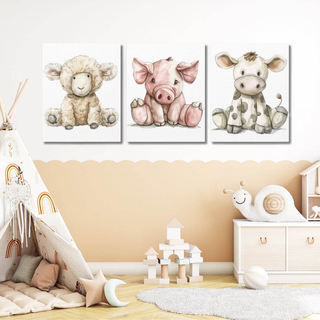 Three cartoon farm animal canvases on a wall with children's room decor below.