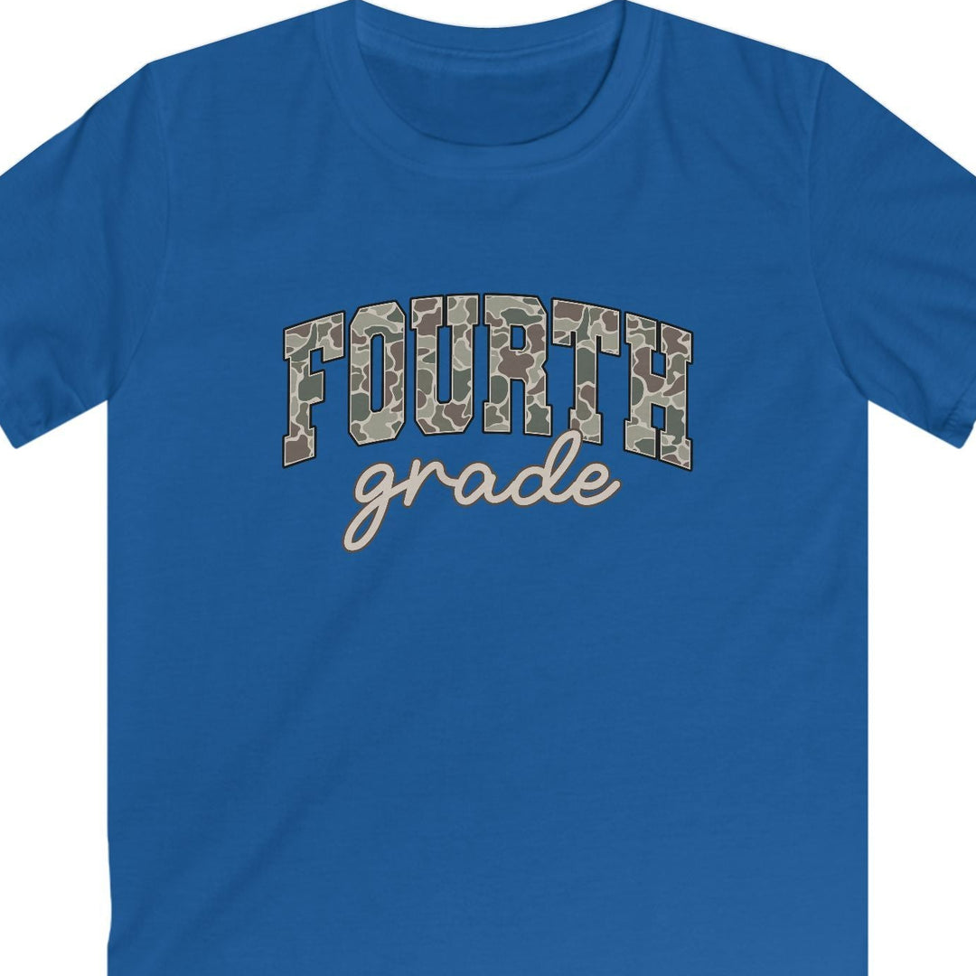 A royal blue short-sleeve t-shirt with 'FOURTH grade' printed on the chest. The word 'FOURTH' is styled in a camouflage pattern, while 'grade' is written below in a light beige cursive font, all on a solid white background.