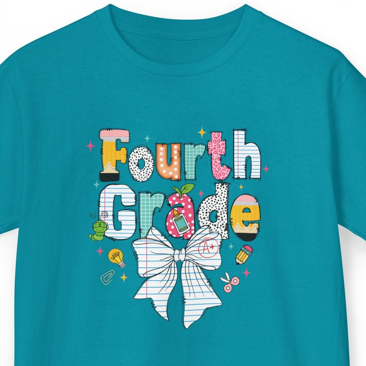 A teal short-sleeve t-shirt with a colorful 'Fourth Grade' graphic on the chest, featuring a white bow illustration and decorative elements, shown against a plain white background.