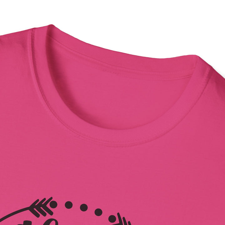 Close-up of a bright pink crewneck t-shirt with a black graphic design partially visible at the bottom.