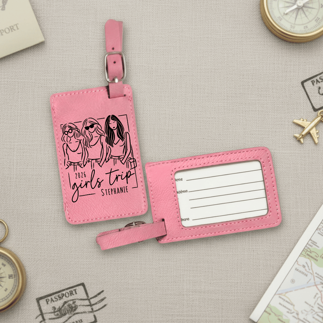 Pink luggage tag with '2026 Girls Trip' design on a travel-themed background