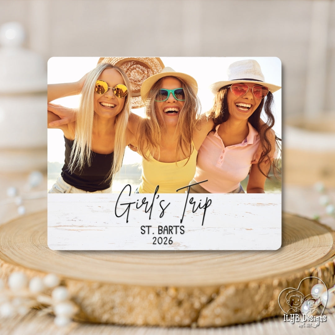 Photo board plaque with three women on a beach and 'Girl's Trip St. Barts 2026' text.