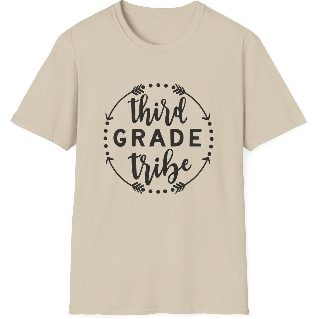 A light beige crewneck t-shirt with a black graphic on the chest that reads 'third GRADE tribe' inside a circular arrow and dot frame, shown on a plain white background.