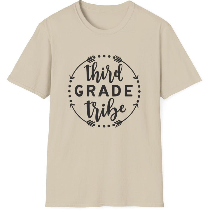A light beige crewneck t-shirt with a black graphic on the chest that reads 'third GRADE tribe' inside a circular arrow and dot frame, shown on a plain white background.