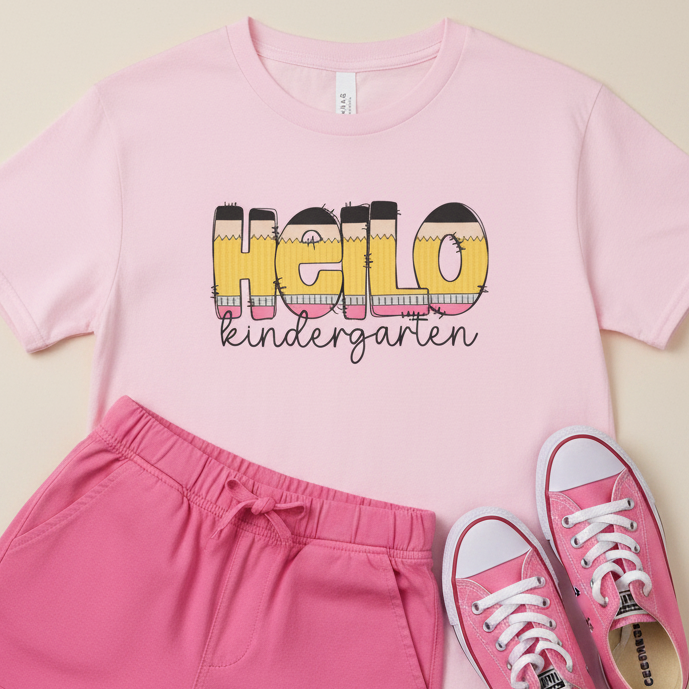 A light pink short-sleeve t-shirt with a graphic on the chest that reads &