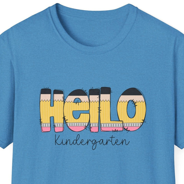 A blue short-sleeve crewneck t-shirt featuring a colorful graphic on the chest that reads 'Hello kindergarten' in a pencil letter font, shown against a plain white background.