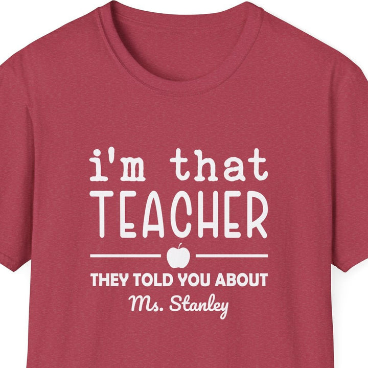 Red t-shirt with a white graphic design that says 'i'm that teacher they told you about' on a white background