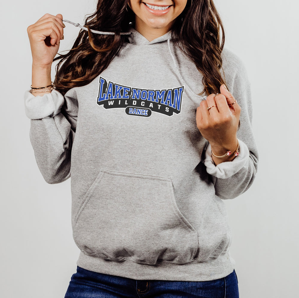 Girl wearing an athletic gray hoodie with 'Lake Norman Wildcats Dance' text.
