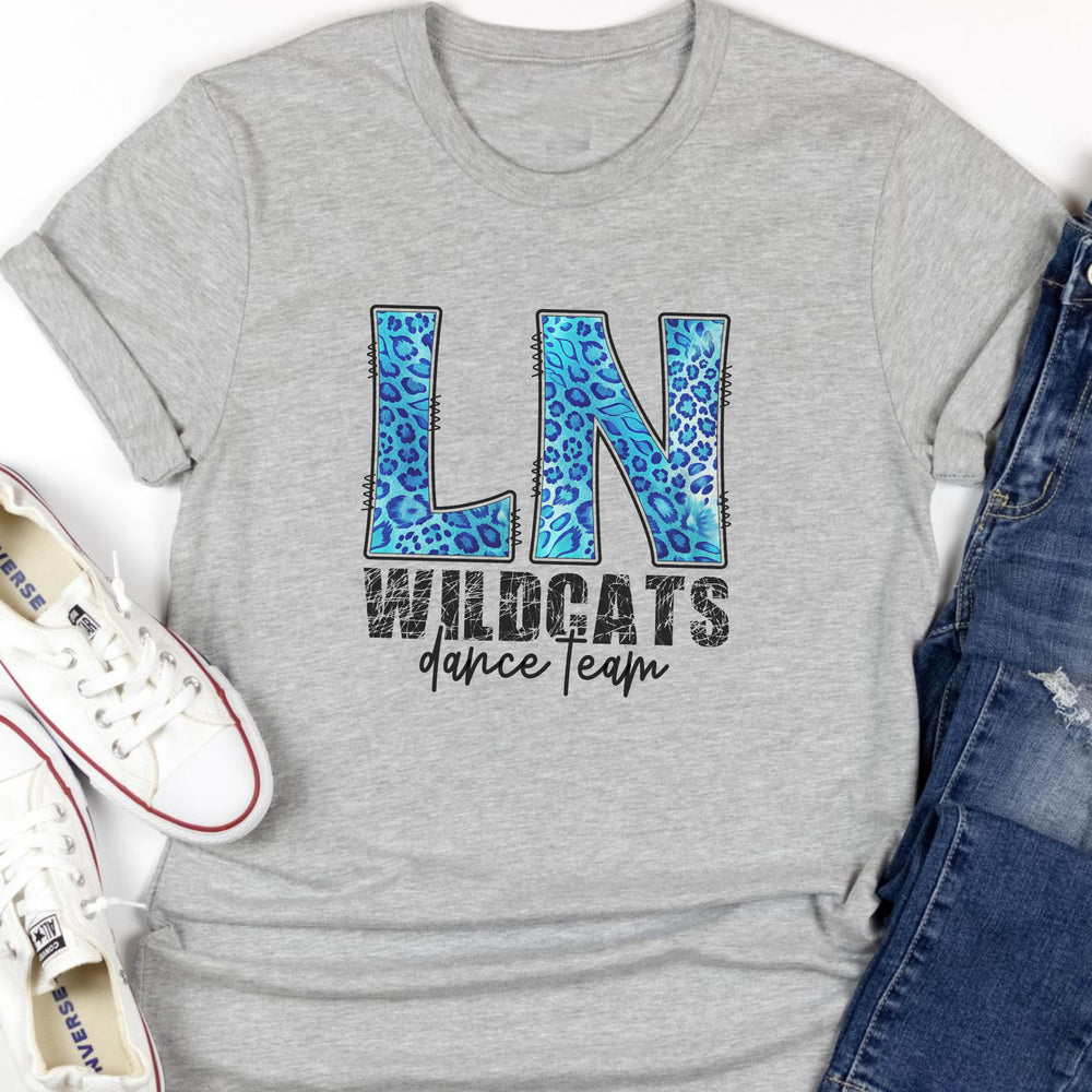 Athletic gray  t-shirt with 'LN Wildcats dance Team' design. The 'LN' is in large blue leopard doodle letters and 'wildcats' is written in a cat scratched font. 'Dance team' is underneath in a modern script font.