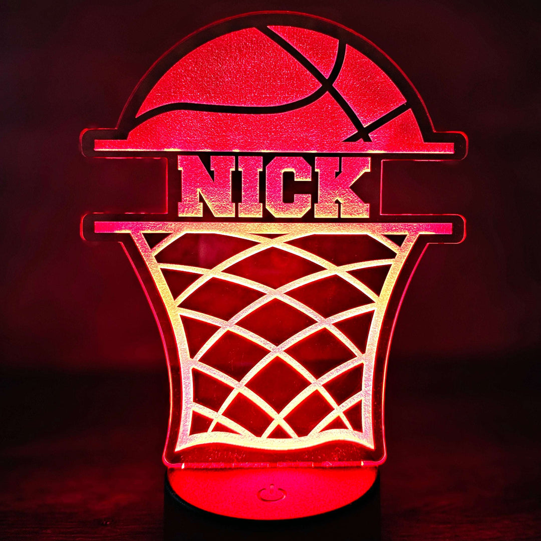 Basketball-themed night light with 'NICK' text on a dark background