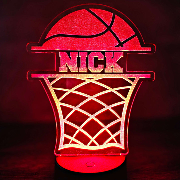 Basketball-themed night light with 'NICK' text on a dark background