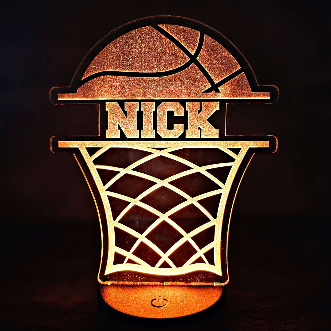 Basketball-themed night light with 'NICK' engraved on acrylic on a dark background