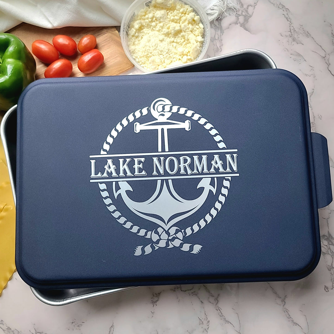 Blue tray with 'Lake Norman' logo on a marble surface with vegetables.