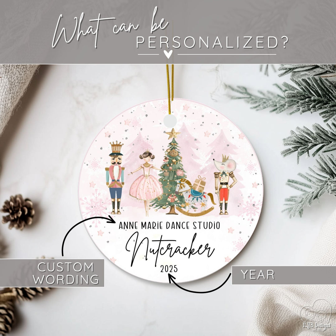 Graphic showing what part of the Nutcracker Christmas ornament can be personalized. Arrows are pointing to the custom wording that says "Anne Marie Dance Studio and year.