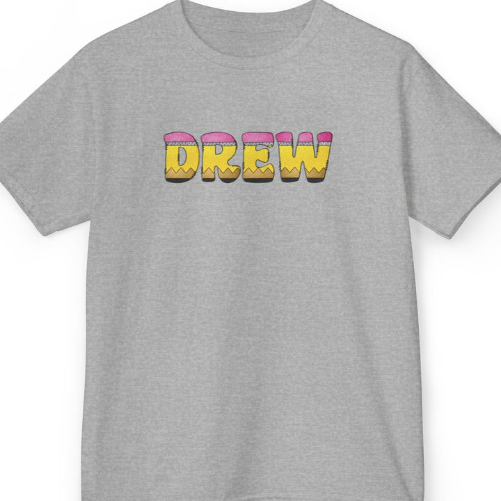 A heather gray short-sleeve t-shirt with pencil letters graphic spelling 'DREW' on a white background.