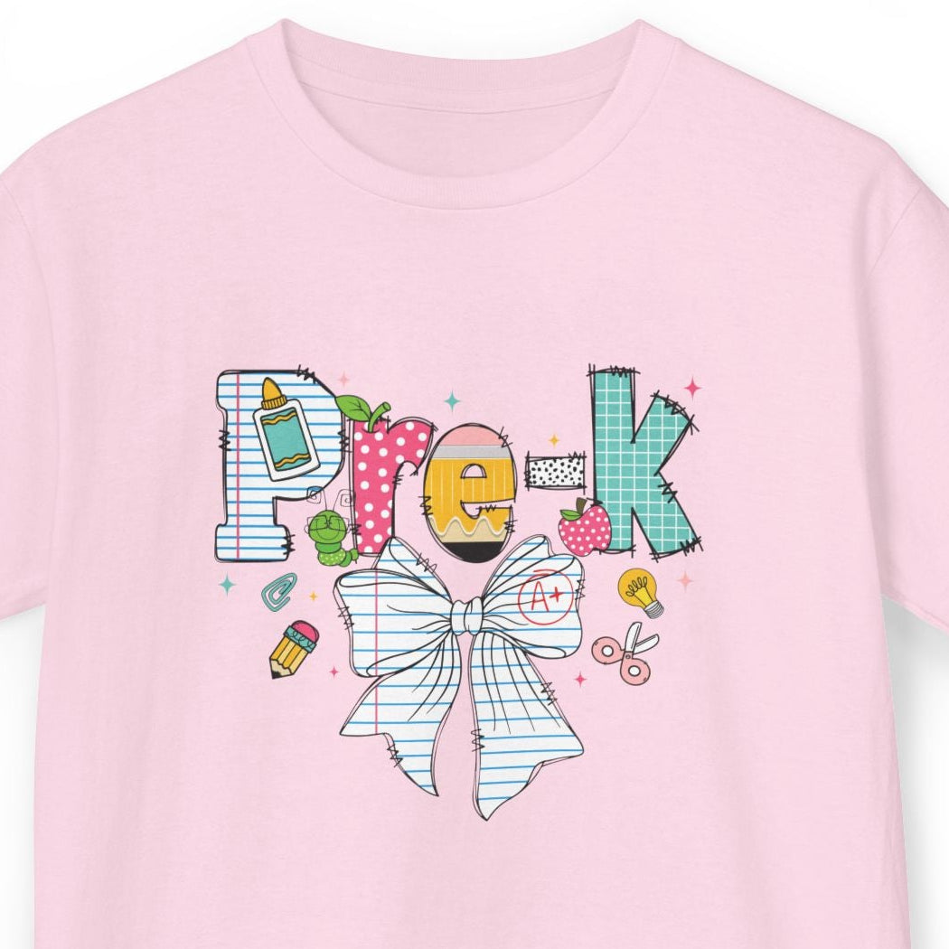 A light pink short-sleeve crewneck t-shirt featuring a colorful graphic on the chest that spells 'Pre-K'  including preppy bow.
