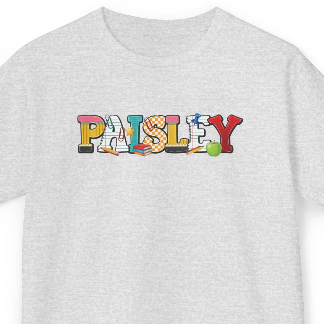 A light ash gray short-sleeve t-shirt with a colorful graphic spelling 'Paisley' across the chest, displayed on a clean white background.