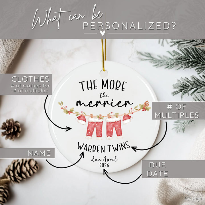 Graphic showing what part of  the more the merrier Christmas ornament can be personalized. Arrows pointing to the names, due date, number of multiples, and the number & type of clothes for the clothesline on the pregnancy announcement ornament. 