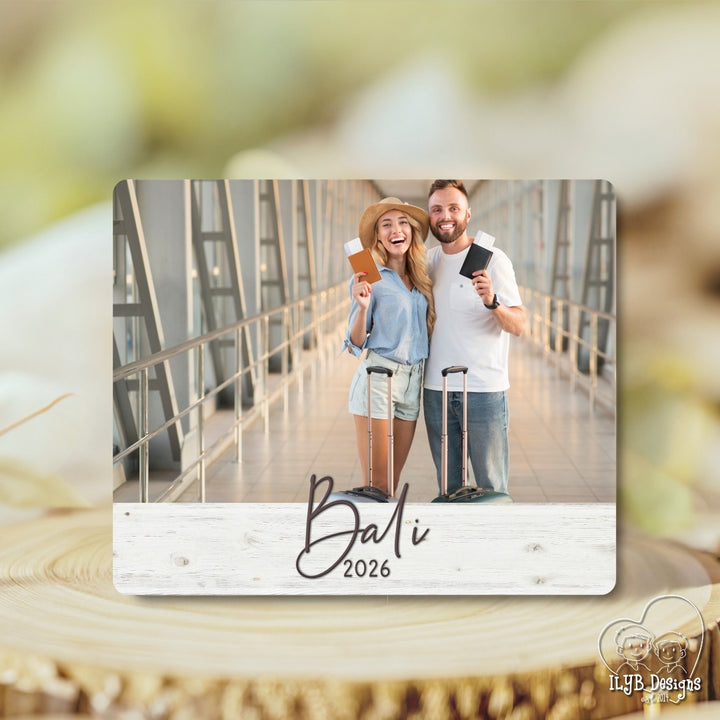 Couple with travel items on a bridge in Bali 2026
