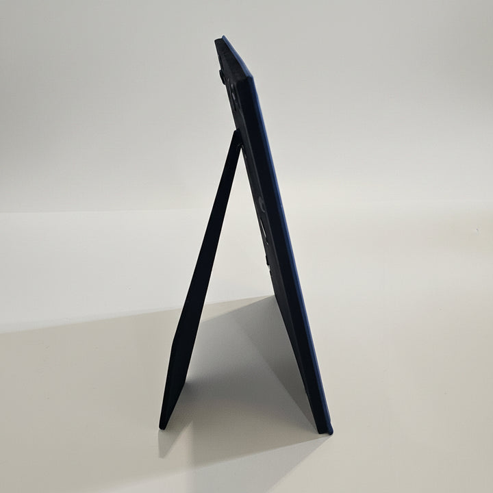 The side view of a picture frame with stand