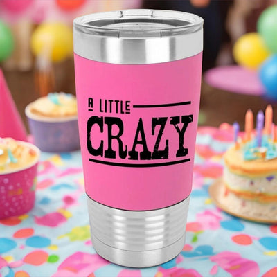 Pink 20 ounce stainless steel coffee tumbler with pink silicone sleeve that  is laser engraved in black and says A Little Crazy.