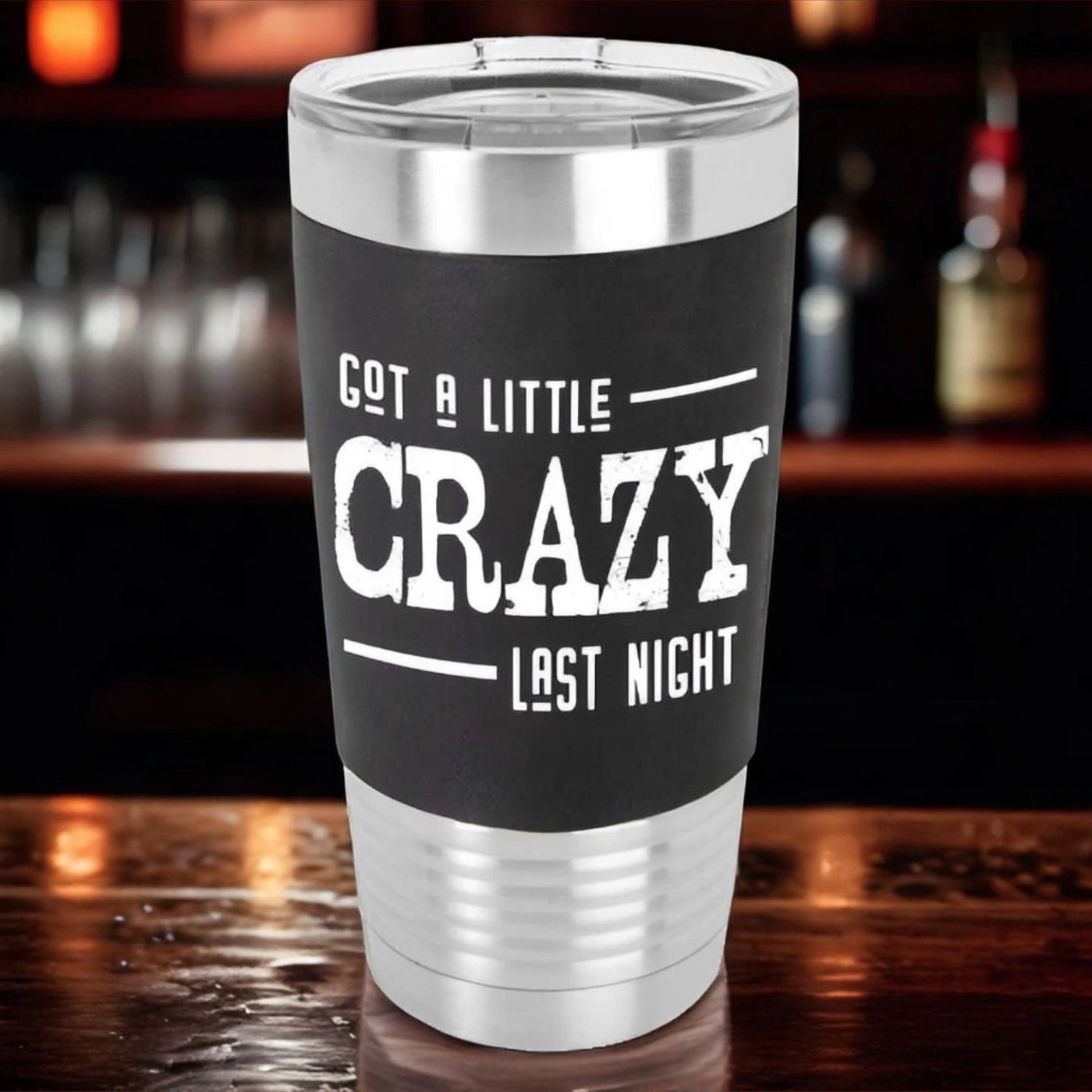 Got a Little Crazy Last Night 20oz Polar Camel Stainless Steel Tumbler with black silicone sleeve. "Got a little crazy last night" is laser engraved in white in a distressed font, making it the perfect personalized drinking tumbler birthday gift.