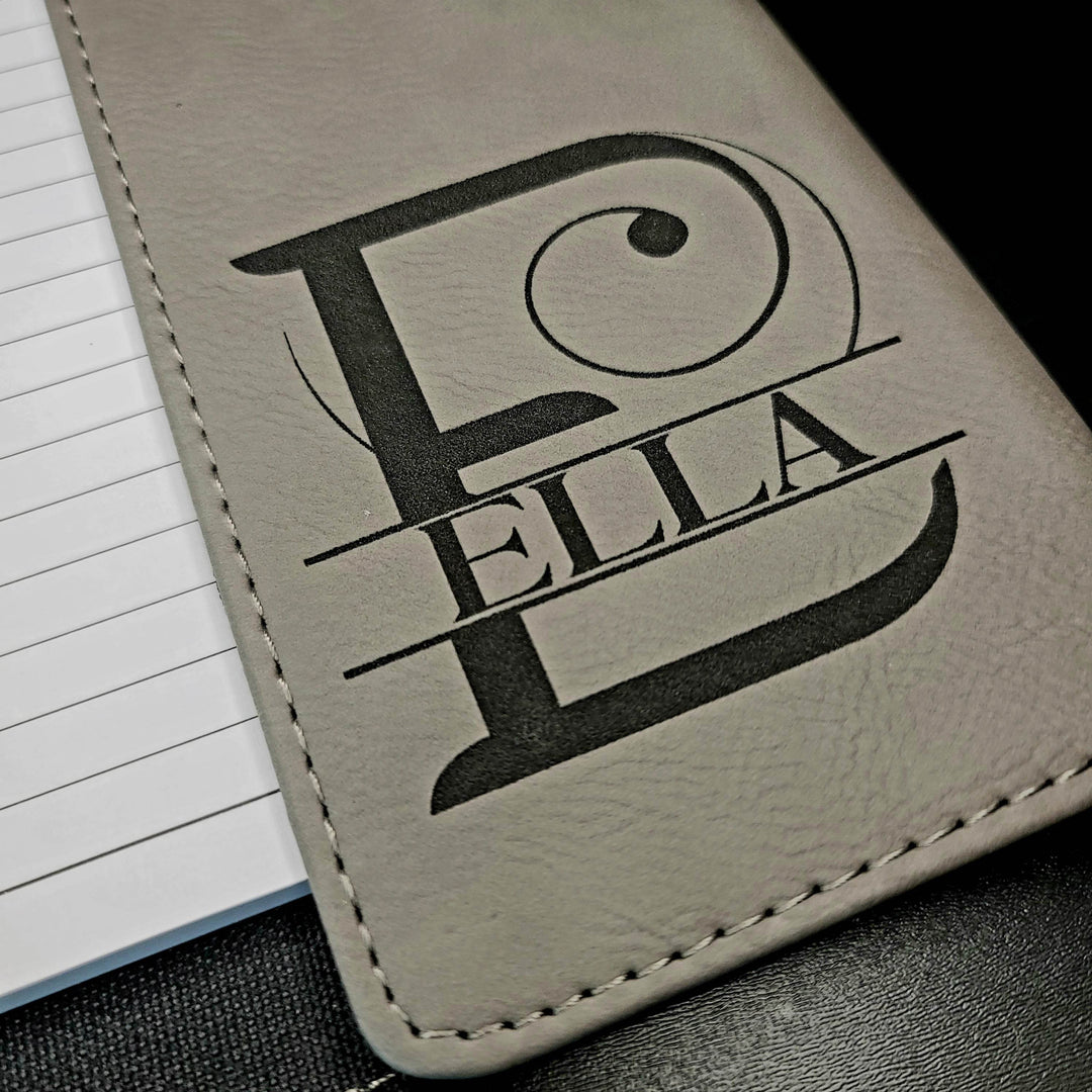 Gray leather notebook cover with 'ELLA' laser engraved in black