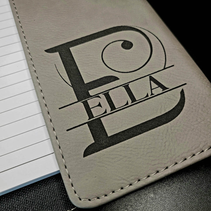 Gray leather notebook cover with 'ELLA' laser engraved in black