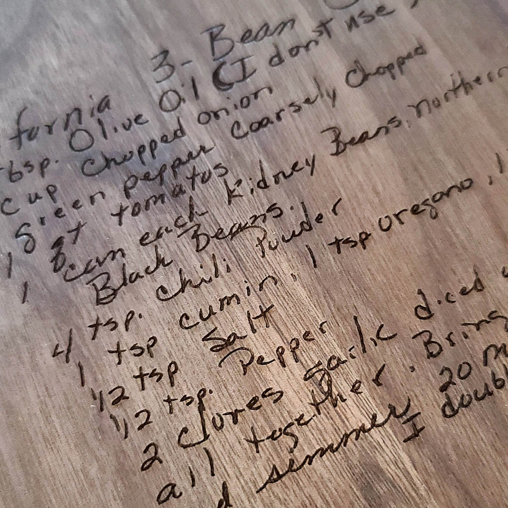 Handwritten recipe on a wooden surface