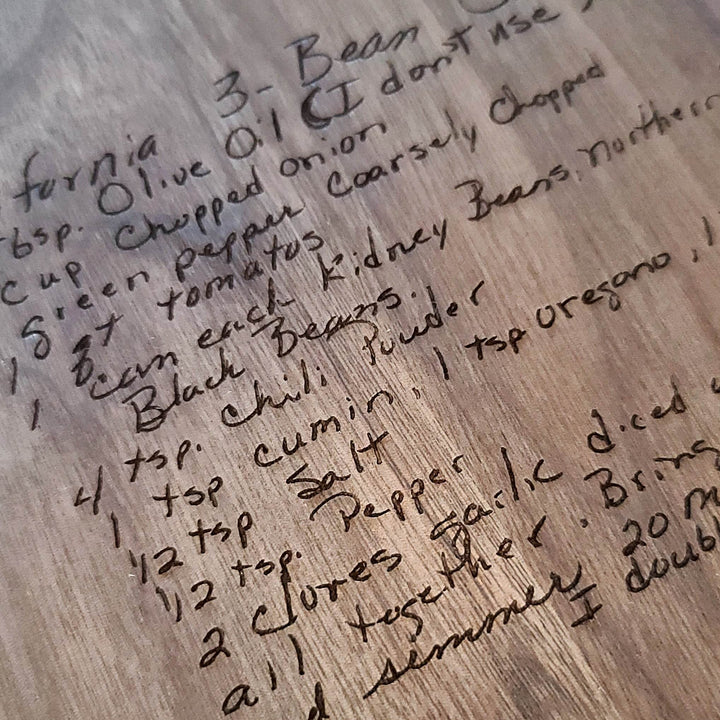 Handwritten recipe on a wooden surface