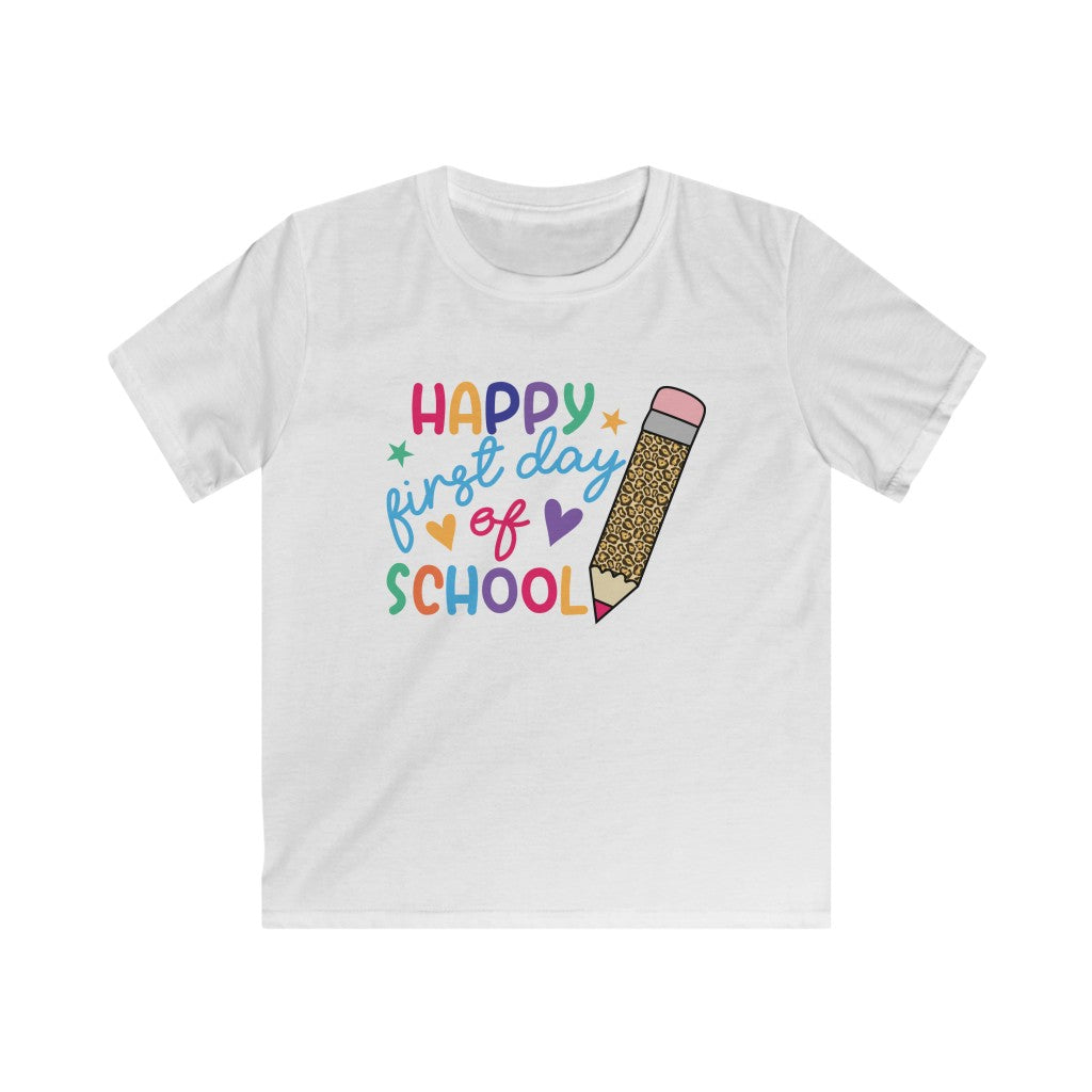 White youth back to school shirt with a whimsical, giant leopard print pencil perfectly complemented by rainbow-colored words that spell out Happy 1st Day of School.