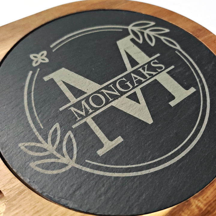 Round slate cheese board with engraved floral monogram